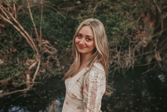 Summerlyn Powers smiles in this promo photo